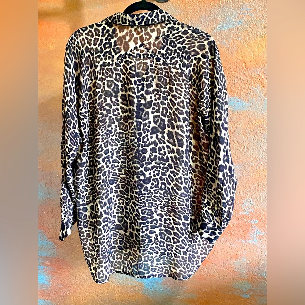 Love stitch. cheetah print. button down blouse